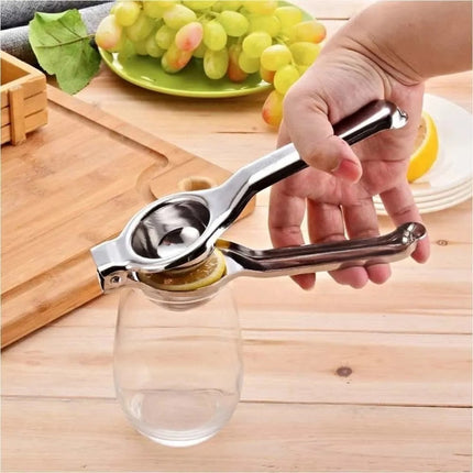 Exprimidor Manual De Lima Limon Citricos Acero Inoxidable Plateado