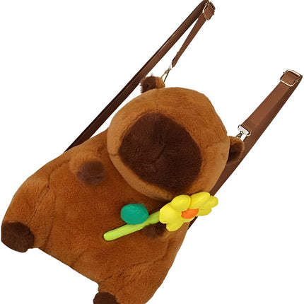 Peluche Capibara Mochila Con Flor Amarilla Marrón